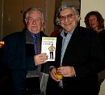 Mike Ripley gives Maxim Jakubowski his Stroke Book.jpg